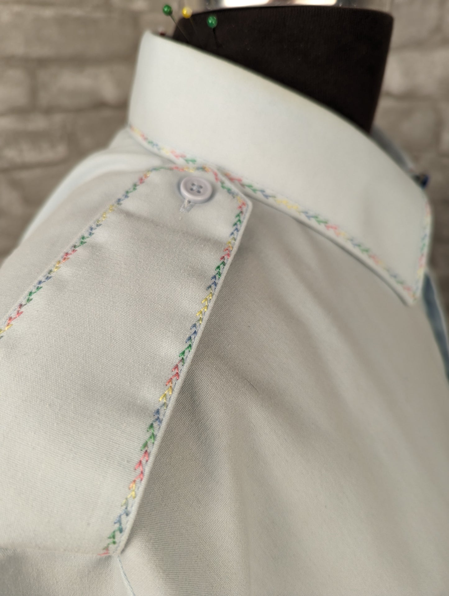 Upcycled vintage military Canadian Airforce shirt with rainbow embroidery detail