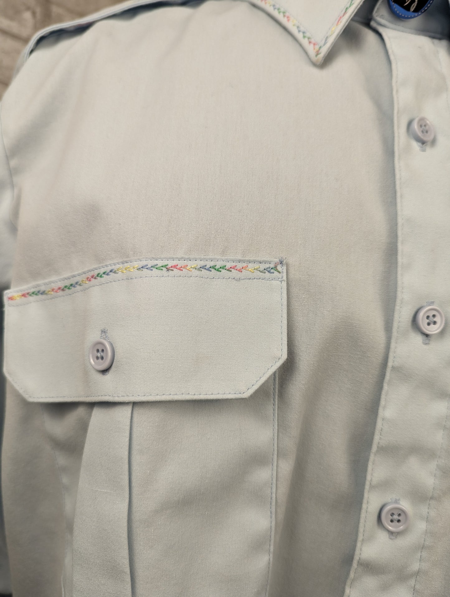 Upcycled vintage military Canadian Airforce shirt with rainbow embroidery detail