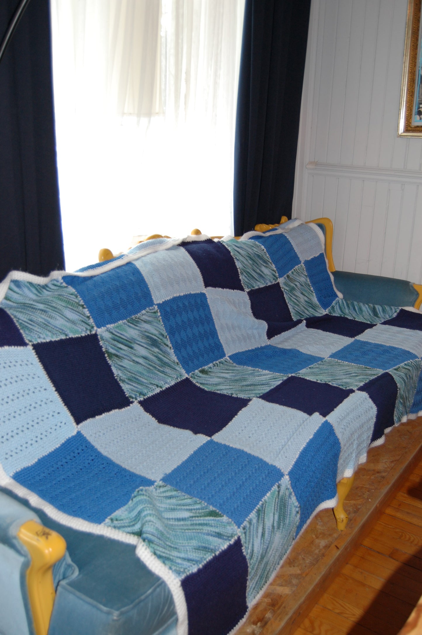 Vintage patchwork handknitted blue granny couch blanket