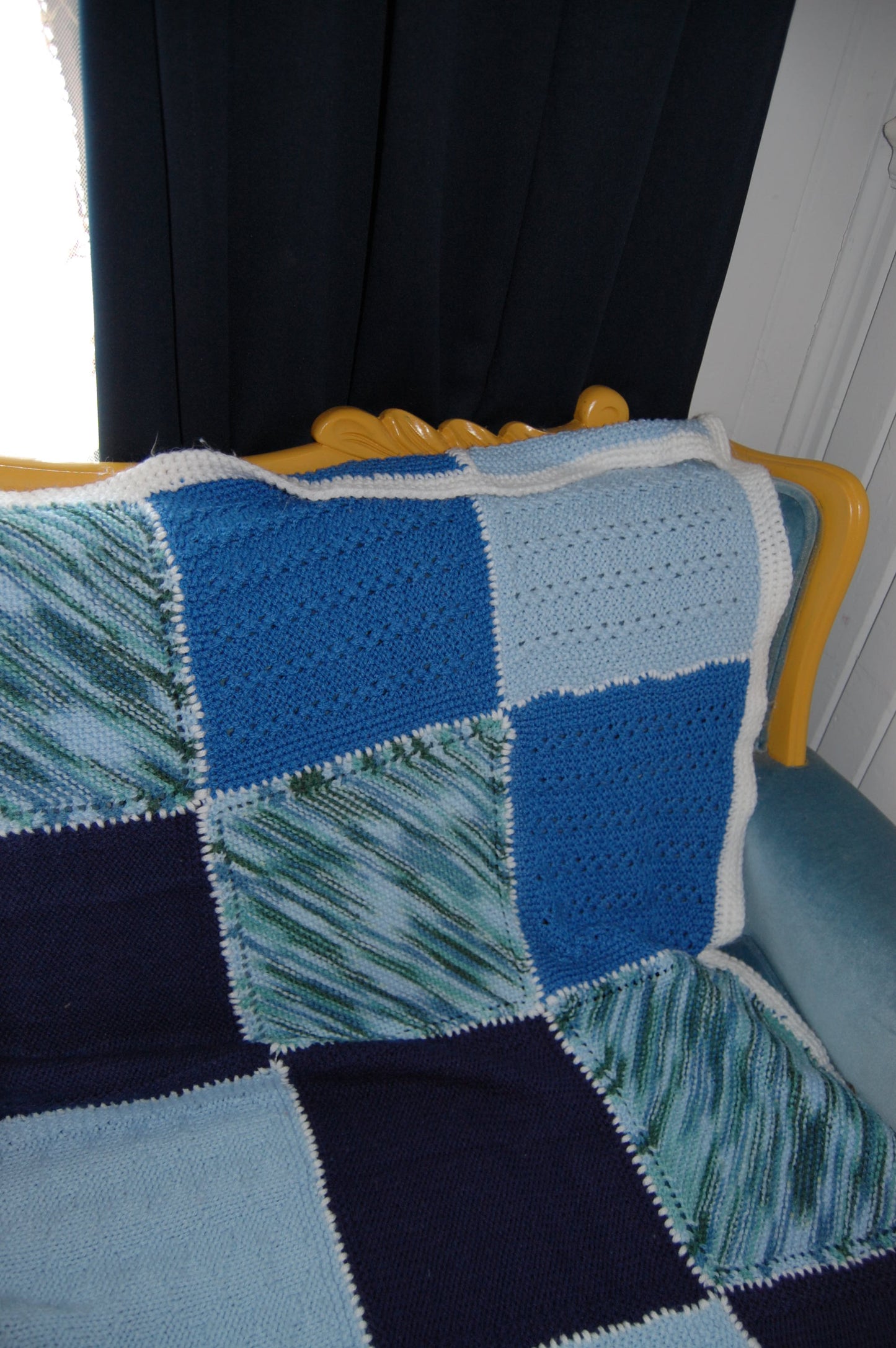 Vintage patchwork handknitted blue granny couch blanket