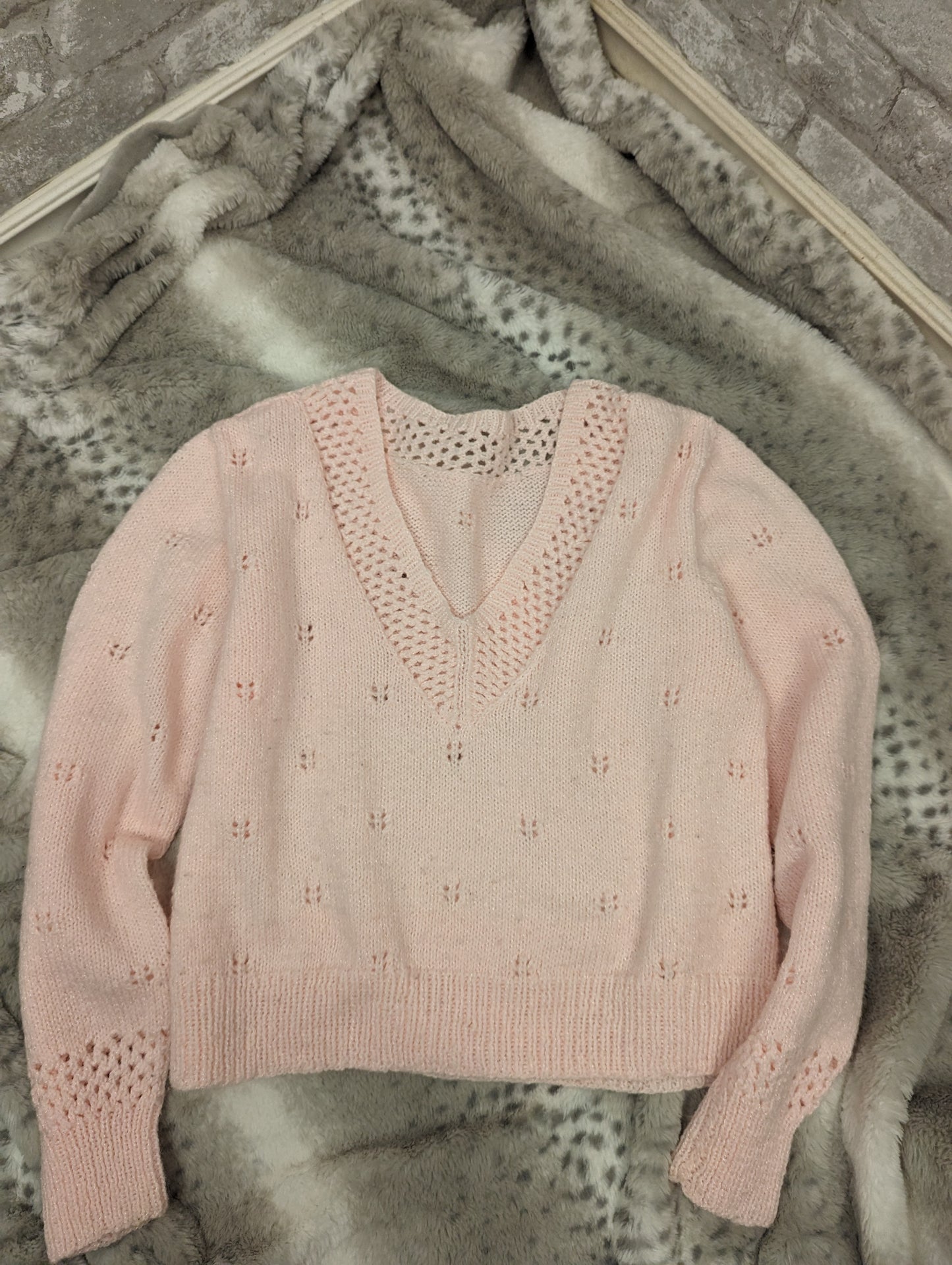 Handknitted pink sweater