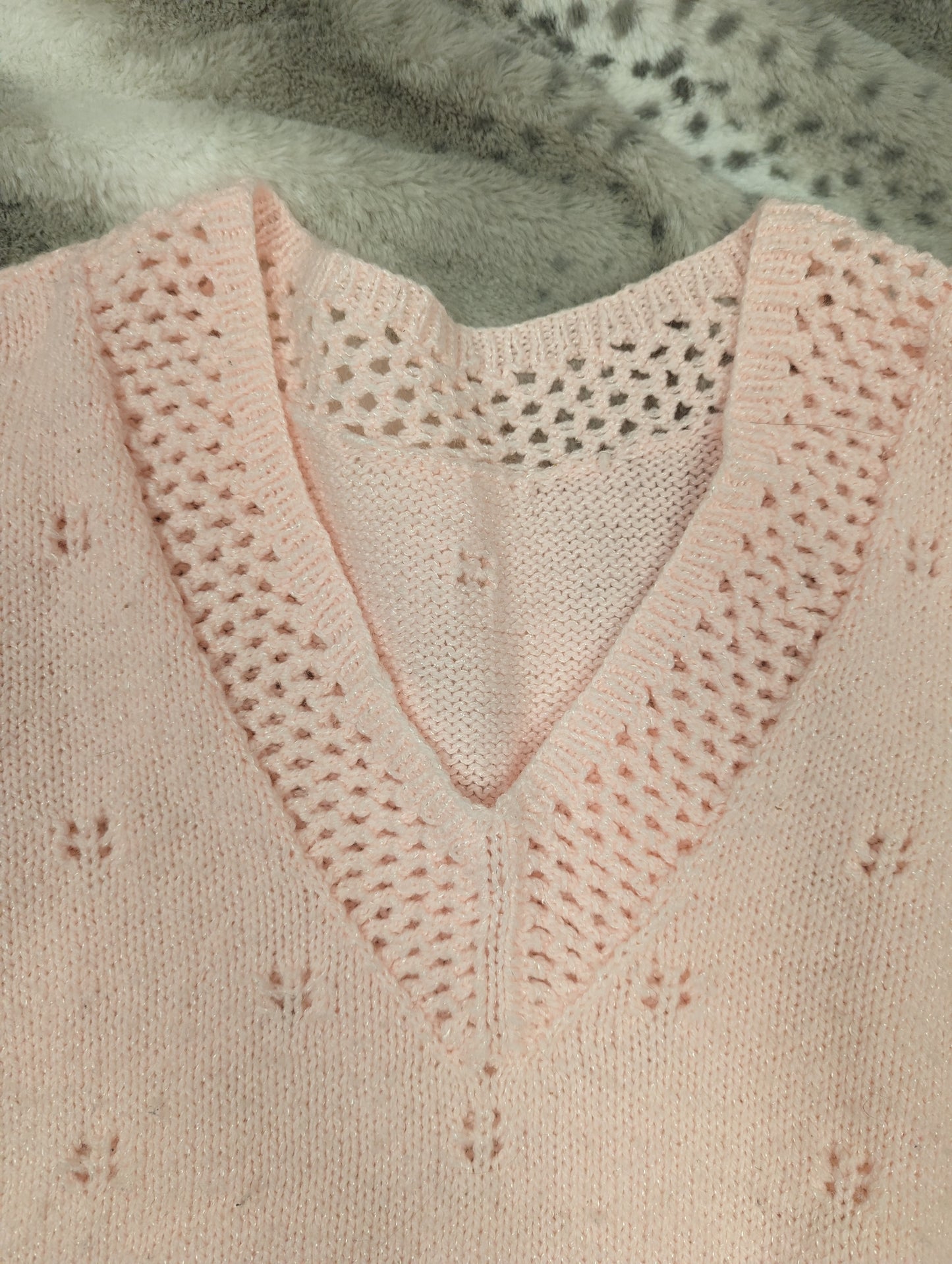 Handknitted pink sweater