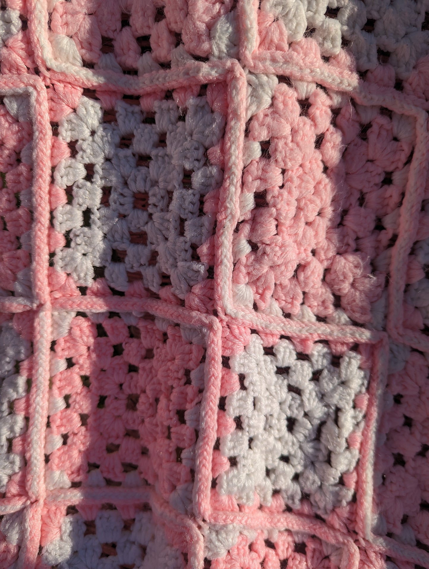 Vintage pink handknitted granny blanket throw